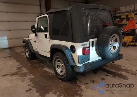 2004 Jeep Wrangler X z USA, uszkodzony, nr VIN 1J4FA39S84P701132